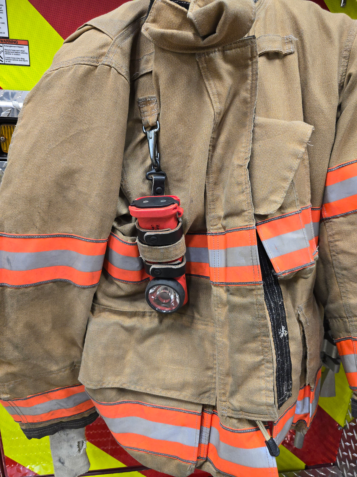 Leather inverted flashlight holder for firefighters