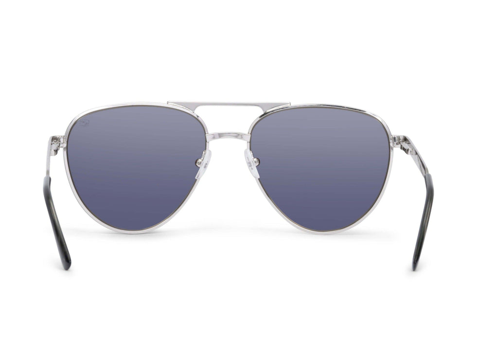 Aviator sunglasses in chrome silver with gray lens, on-face view